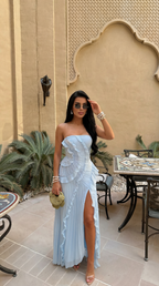 Sky Blue strapless maxi dress shown with its ruffled strapless bodice.