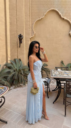 Strapless maxi dress shown with its ruffled strapless bodice.