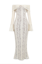 Close-up detail of the White lace maxi dress fabric and finish.