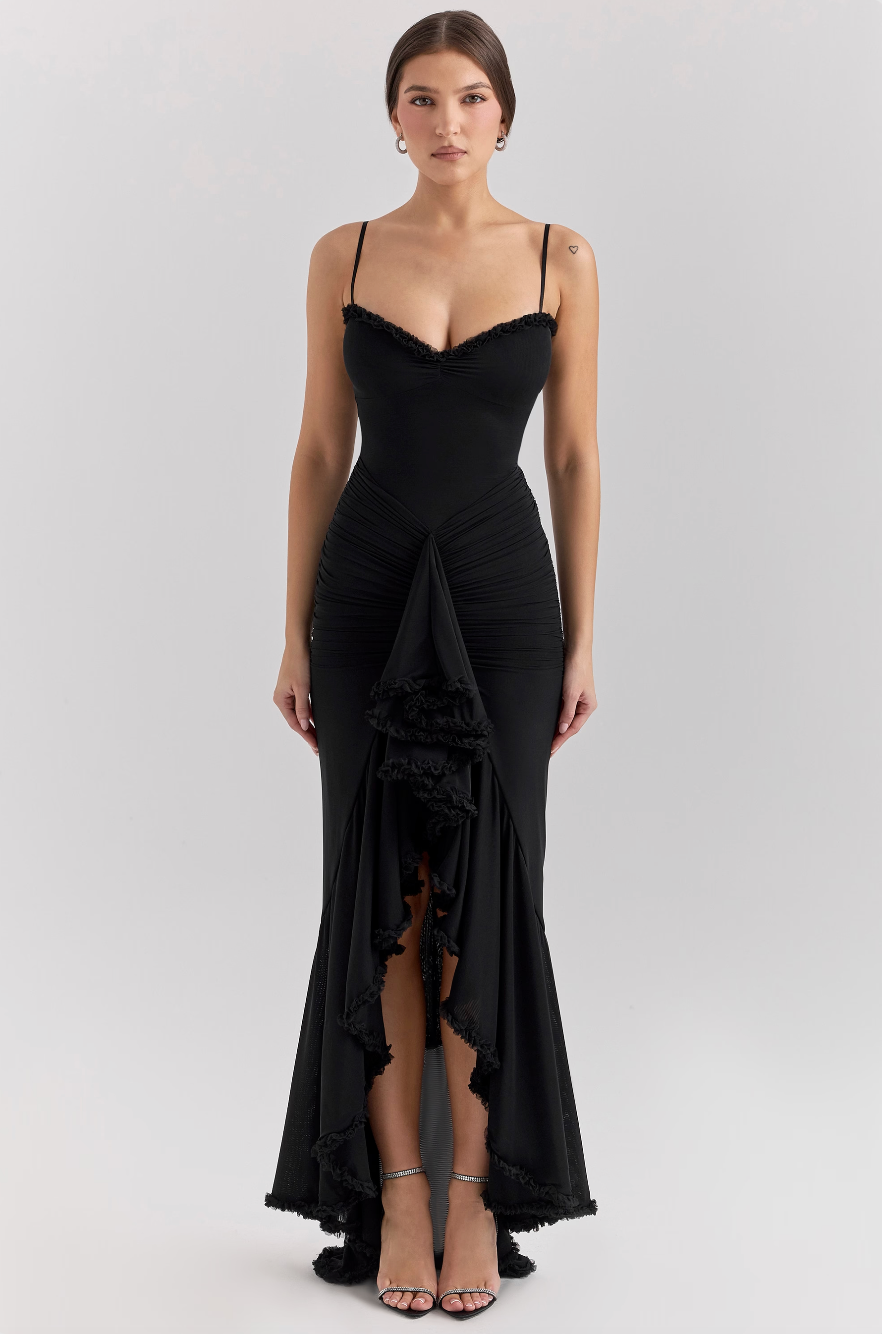 Black bodycon maxi dress shown with its silky lightweight fabric.