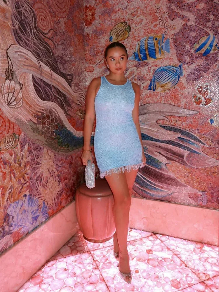 Sequin mini dress in Blue, showing the fitted, flattering shape.