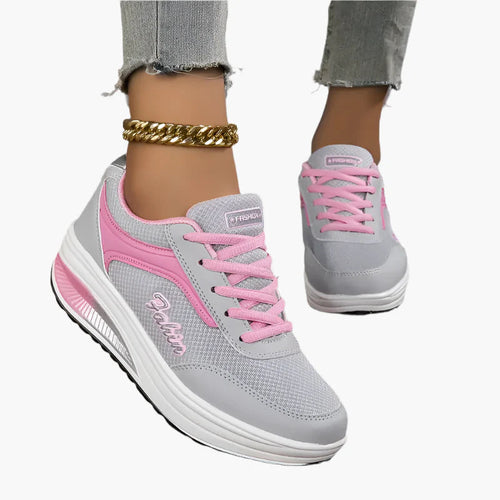 Women's orthopedic sneakers in black with supportive air cushion footbed