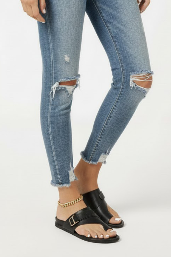 Black comfort sandals with textured strap and buckle detail