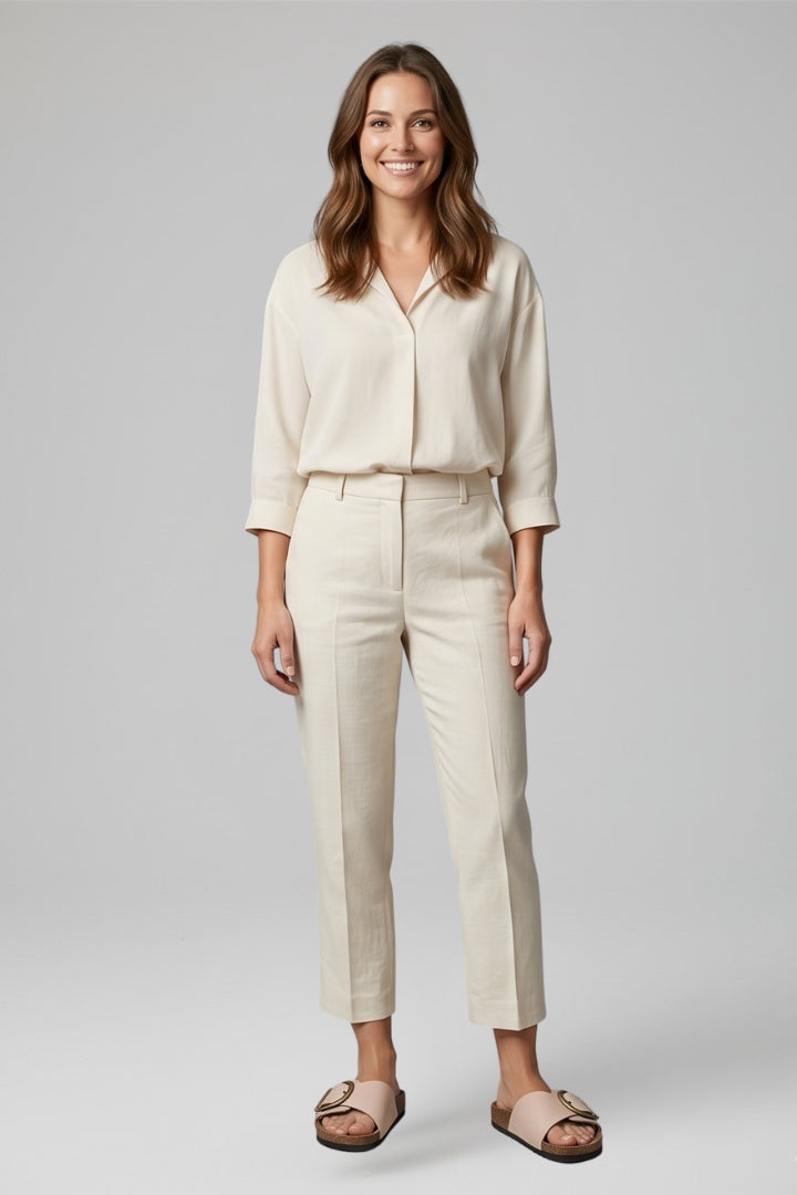 Model wearing cream buckle comfort sandals styled with a matching co-ord