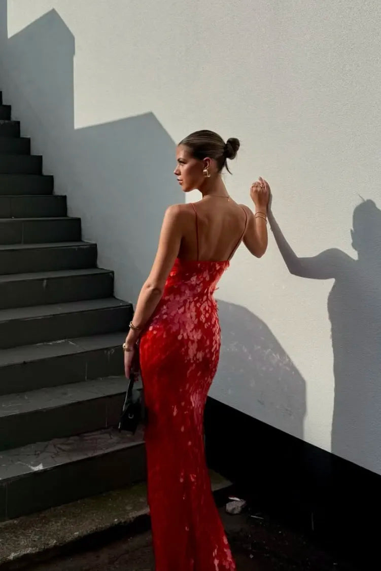 Sequin maxi dress in Red, showing a deep V-neckline and slim straps.